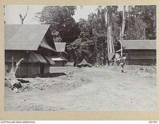 SORAKEN AREA, BOUGAINVILLE. 1945-04-03. ADMINISTRATION BUILDINGS AT 11 INFANTRY BRIGADE. THE AREA INCLUDES THE OFFICES OF THE BRIGADE MAJOR, LIAISON OFFICER, STAFF CAPTAIN, REGIMENTAL AID POST AND ..