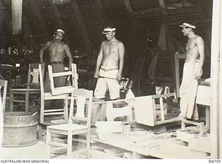 Japanese prisoners held at the RAN War Criminal Compound at an RAN shore base are working as joiners building chairs. Work on this RAN base commenced in August 1948. It was commissioned as HMAS ..