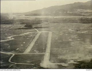 NADZAB, NEW GUINEA. 1944-02-15. AERIAL PHOTOGRAPH OF PARALLEL RUNWAYS AT ONE OF THE AIRSTRIPS AT THE ALLIED BASE