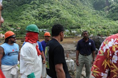 Earthquake ^ Tsunami - Pago Pago, American Samoa, October 9, 2009 -- Federal Coordinating Officer Kenneth Tingman talks to employees from a local tuna canning company during an island-wide debris clean-up. The American Samoa Government established a two-day clean-up effort bringing together local and federal government workers along with local businesses and citizens. Dan Stoneking/FEMA