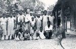 Rev. Bell, his wife among a group of parishioners of the New Hebrides