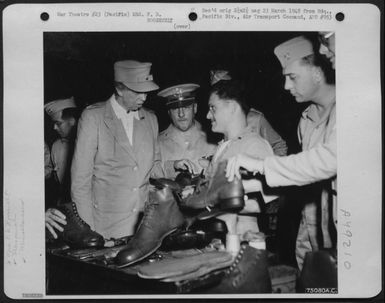 During Her Tour Of The Pacific Area Mrs. F. D. Roosevelt Is Shown Size 19 1/2 Shoes At The Cobbler Shop At Noumea, New Caledonia Islands, 1943. (U.S. Air Force Number 75080AC)