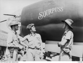 Crew members standing in front of a United States Army Air Force (USAAF) B26 Martin Marauder bomber which has been named 'sourpuss'. Identified from left to right: Charles Smith of South Carolina, ..