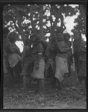 Group of men, women and children