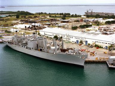 A starboard bow view of the combat stores ship USS NIAGARA FALLS (AFS 30) moored at the US Naval Ship Repair Facility