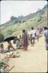 Tabibuga: people selling sweet potatoes, greens and other garden produce at market