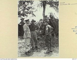 BOIKEN AREA, AITAPE-WEWAK SECTOR. 1945-04-28. LIEUTENANT GENERAL V.A.H. STURDEE, GENERAL OFFICER COMMANDING FIRST ARMY (1), WITH LIEUTENANT COLONEL A.G. CAMERON, 2/2 INFANTRY BATTALION, AND MAJOR ..