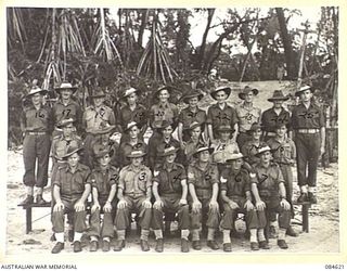 GREEN ISLAND, BOUGAINVILLE AREA, SOLOMON ISLANDS. 1944-12-19. NCOS AND OTHER RANKS OF THE HOSPITAL AND KITCHEN STAFF IN THE OFFICERS' LINES AT HQ 17 FIELD AMBULANCE. THE LINES, SITUATED NOT MORE ..