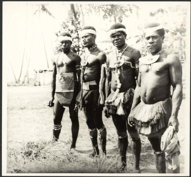 Four male dancers at Awar, Sepik River, New Guinea, 1935, 1 / Sarah Chinnery