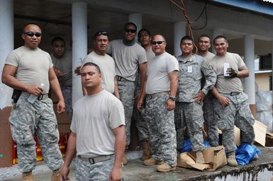 Earthquake ^ Tsunami - Asili, American Samoa, October 7, 2009 -- Soldiers of the Army Reserve take a well earned rest break after a long day of work. Teaming with FEMA and the American Samoan Government these soldiers helped establish a supply distribution point in the village of Asili. David Gonzalez/FEMA