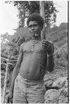 Laete'eboo the priest, holding object that is probably matala ancestral relic he is going to use in the ritual