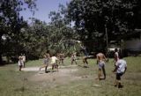 French Polynesia, school children playing volleyball on Tahiti Island