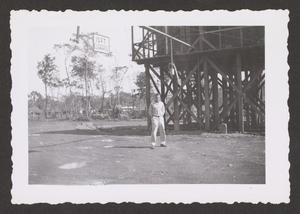 [Serviceman Beside Water Tanks, #1]