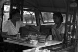 Guam, women eating in a van