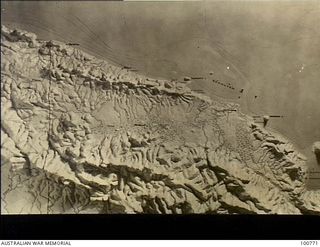 Melbourne, Vic. 1945-04-18. A relief map at L Block, Land HQ, Victoria Barracks, St Kilda Road, showing the Aitape to Hansa Bay area, New Guinea, and taking in the Torricelli Mountains