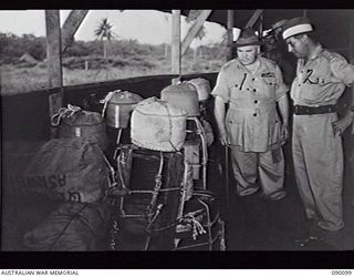 AITAPE, NEW GUINEA. 1945-03-20. AT THE 2/160TH AUSTRALIAN SUPPLY DEPOT PLATOON. GENERAL SIR THOMAS A. BLAMEY (LEFT) COMMANDER IN CHIEF, ALLIED LAND FORCES, SOUTH WEST PACIFIC AREA AND VX106081 ..