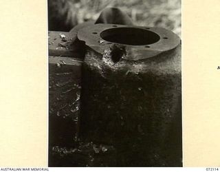 FORTIFICATION POINT, NEW GUINEA. 1944-04-06. THE EFFECT OF A HOLLOW CHARGE PROJECTILE FIRED FROM A JAPANESE 75MM REGIMENTAL GUN TYPE MEIJI 41 AT THE FRONTAL ARMOUR OF A DISABLED MATILDA TANK DURING ..