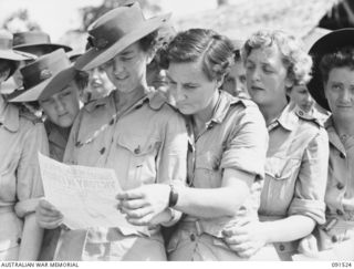 LAE, NEW GUINEA, 1945-05-08. AT 1400 HOURS PERSONNEL AT THE AWAS BARRACKS IN BUTIBUM ROAD WERE CALLED TOGETHER AND AN ANNOUNCEMENT WAS MADE THAT GERMANY HAD UNCONDITIONALLY SURRENDERED TO THE ..