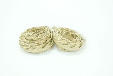 Roll of plaited fibre