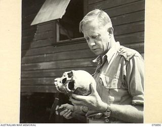 LITTLE EDIE CREEK, NEW GUINEA, 1944-02-25. QX22008 CAPTAIN F.W. WHITEHOUSE, A LECTURER IN GEOLOGY AT QUEENSLAND UNIVERSITY PRIOR TO ENLISTMENT IS AND PRESENT THE ACTING ADJUTANT OF THE COMMANDER ..