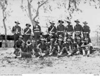 POM POM VALLEY, NEW GUINEA. 1943-11-27. BAND OF THE 18TH AUSTRALIAN INFANTRY BRIGADE WHICH SUPPLIED THE MUSIC FOR THE GUARD UNIT OF THE 2/10TH AUSTRALIAN INFANTRY BATTALION DURING THE TAKING OF A ..
