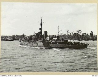 PHOTOGRAPH TAKEN BY CHIEF STOKER A.J. DAVIS WHILE SERVING ABOARD H.M.A.S. "BROOME". 1943-44. H.M.A.S. "BENDIGO" AT MADANG, NEW GUINEA