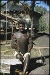 Man holding pottery