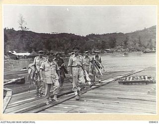 RABAUL, NEW BRITAIN. 1945-10-28. FOLLOWING INSPECTION OF A CEREMONIAL PARADE AND MARCH PAST BY TROOPS OF 11 DIVISION AT THE DIVISION PARADE GROUND, GENERAL SIR THOMAS A. BLAMEY, COMMANDER-IN-CHIEF, ..