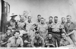 PORT MORESBY, PAPUA, 1942. ORIGINAL MEMBERS OF THE AUSTRALIAN ARMY AMENITIES SERVICE'S MOBILE CINEMA UNITS IN PAPUA. LEFT TO RIGHT: BACK ROW: WARRANT OFFICER 1 BERT HINCHEY; SERGEANT (SGT) ..