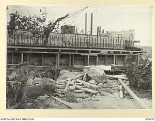 PORT MORESBY, PAPUA. 1944-10-18. FRONT VIEW OF THE BATTERY OBSERVATION POST FRAMEWORK AND REINFORCING IN POSITION FOR THE FINAL POUR OF CEMENT AT THE BASILISK BATTERY, 801ST ANTI-AIRCRAFT AND COAST ..