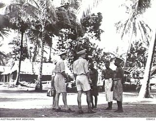 AN AUSTRALIAN NEW GUINEA ADMINISTRATIVE UNIT (ANGAU) ADMINISTRATIVE HQ WAS SET UP AT KAVIENG, NEW IRELAND, WITH CAPTAIN F. N. W. SHAND, ANGAU DISTRICT OFFICER, IN CHARGE, TO OPERATE IN NEW IRELAND ..