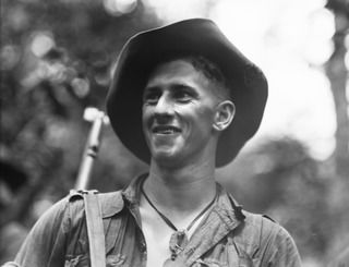 MOUNT PROTHERO AREA, NEW GUINEA. 1944-01-21. NX88361 PRIVATE T. BYE OF THE 2/2ND PIONEER BATTALION WHO HAS JUST RETURNED FROM A PATROL OF THE MOUNT PROTHERO AREA