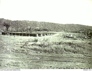 NEW IRELAND, 1945-10. GENERAL VIEW OF A STORAGE AREA OF MIXED JAPANESE EQUIPMENT. (RNZAF OFFICIAL PHOTOGRAPH.)