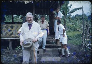 Archbishop Mowll at the mess with Bishop David Hand, District Officer Fred Kaad and Roger Claridge, Saiho, Papua New Guinea, 1951 / Albert Speer