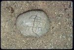 Kairiru: child's drawing of an airplane, made on a stone