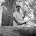 Fiji, man beating drum