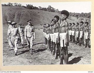 NADZAB AREA, NEW GUINEA, 1945-06-27. HIS ROYAL HIGHNESS, THE DUKE OF GLOUCESTER, GOVERNOR GENERAL OF AUSTRALIA, (2) ACCOMPANIED BY LT-COL J.C. MULLALY, COMMANDING OFFICER DEPOT BATTALION (1), ..