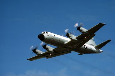 A left front view of a P-3 Orion patrol aircraft taking off