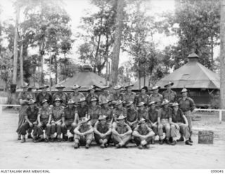 TOROKINA, BOUGAINVILLE, 1945-11-24. PERSONNEL OF 14TH AND 15TH PLATOONS, C COMPANY, 27TH INFANTRY BATTALION. STANDING LEFT TO RIGHT: NX124175 LANCE CORPORAL (LCPL) D.N. ASHTON, QX61488 PRIVATE ..
