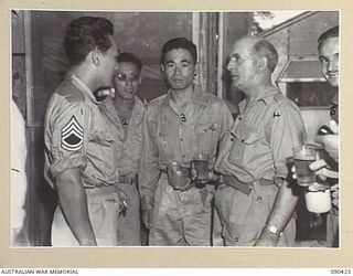 TOROKINA, BOUGAINVILLE. 1945-04-09. SENATOR J.M. FRASER, ACTING MINISTER FOR THE ARMY (4), SPEAKING IN THE SGTS MESS AT HQ 2 CORPS WITH MEMBERS OF THE GENERAL HEADQUARTERS LANGUAGE DETACHMENT. THE ..