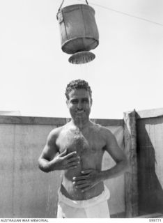 BORAM BEACH, NEW GUINEA, 1945-10-14. ELEVEN INDIAN SOLDIERS WERE LIBERATED FROM THE JAPANESE AT MARIENBERG IN THE SEPIK RIVER AREA, AND TAKEN TO 2/15TH FIELD AMBULANCE FOR MEDICAL TREATMENT. SHOWN, ..