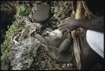 Man on top of skull shrine