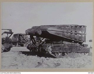 TOROKINA, BOUGAINVILLE, 1945-05-06. A 17 TON "COVENANTER" BRIDGE TANK. THIS VEHICLE CARRIES A 20-FOOT SPAN BRIDGE WHICH CAN BE LAID BY THE DRIVER OF THE TANK WITHOUT LEAVING THE COCKPIT. THE BRIDGE ..