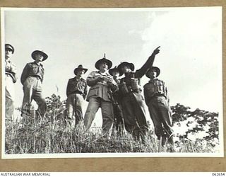 GORGE RIVER AREA, RAMU VALLEY, NEW GUINEA. 1943-12-18. VX1 GENERAL SIR THOMAS BLAMEY GBE KCB CMG DSO ED, COMMANDER-IN-CHIEF, ALLIED LAND FORCES SOUTH WEST PACIFIC AREA AND PARTY AT THE 2/31ST ..