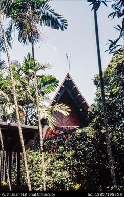 Fiji - white building with pointed roof, blue cap