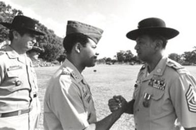 Soldier being Congratulated on Medal, 1975 August 8