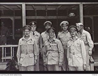 TOROKINA, BOUGAINVILLE. 1945-09-08. LIEUTENANT-GENERAL (LT-GEN) S. G. SAVIGE, GENERAL OFFICER COMMANDING 2 CORPS, ACCEPTED THE SURRENDER OF ALL JAPANESE FORCES ON BOUGAINVILLE FROM LT-GEN M. KANDA, ..