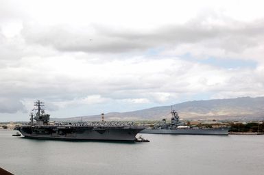 The US Navy (USN) Aircraft Carrier USS NIMITZ (CVN 68) enters Pearl Harbor for a scheduled port visit to Hawaii (HI). The NIMITZ is deploying in support of the global war on terrorism
