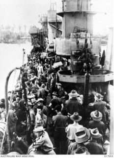 Madang, New Guinea. 1944-04. Reinforcements on an Australian warship reach Madang after its capture from the Japanese