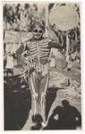 Person dressed in skeleton costume